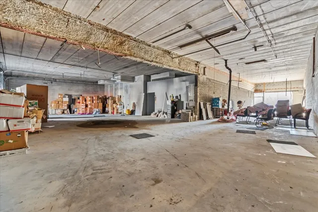an aerial view of a chairs and table on the terrace
