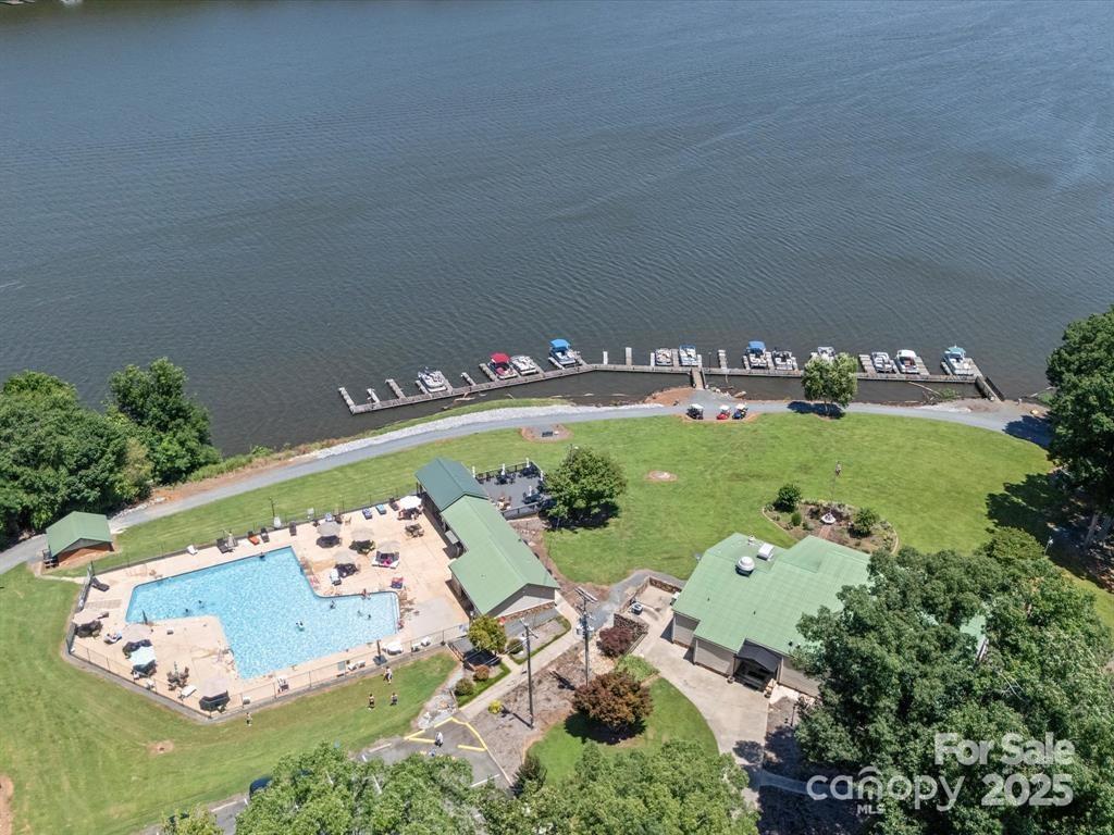 130 Jubal Reeves Circle Mount Gilead, NC 27306 - Photo 5 of 12 a view of a table and chairs in a garden