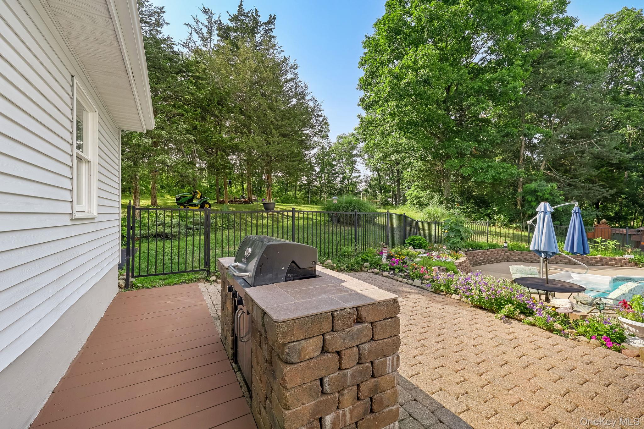 185 Rombout Road Pleasant Valley, NY 12569 - Photo 10 of 49 a view of a chairs and table on the wooden deck