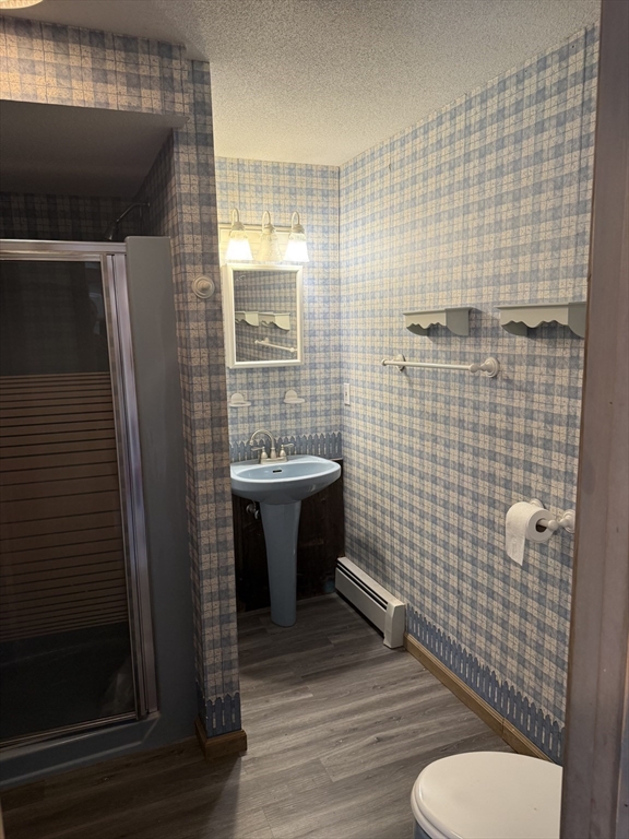 1511 Dunhamtown Brimfield Road Brimfield, MA 01010 - Photo 25 of 36 a bathroom with a toilet sink and shower