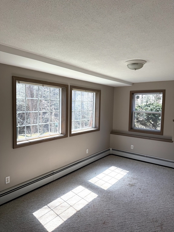 1511 Dunhamtown Brimfield Road Brimfield, MA 01010 - Photo 34 of 36 a view of an empty room with a window
