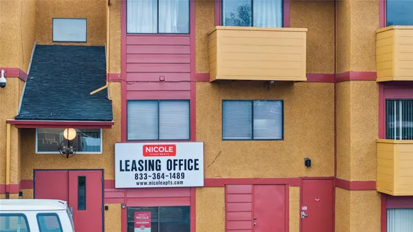 a sign that is on the wall of a building