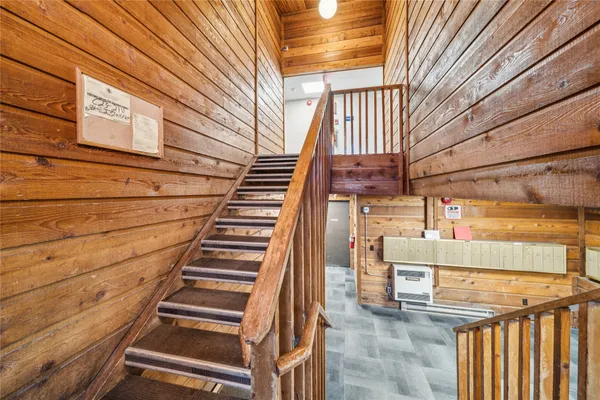 a view of entryway with wooden floor