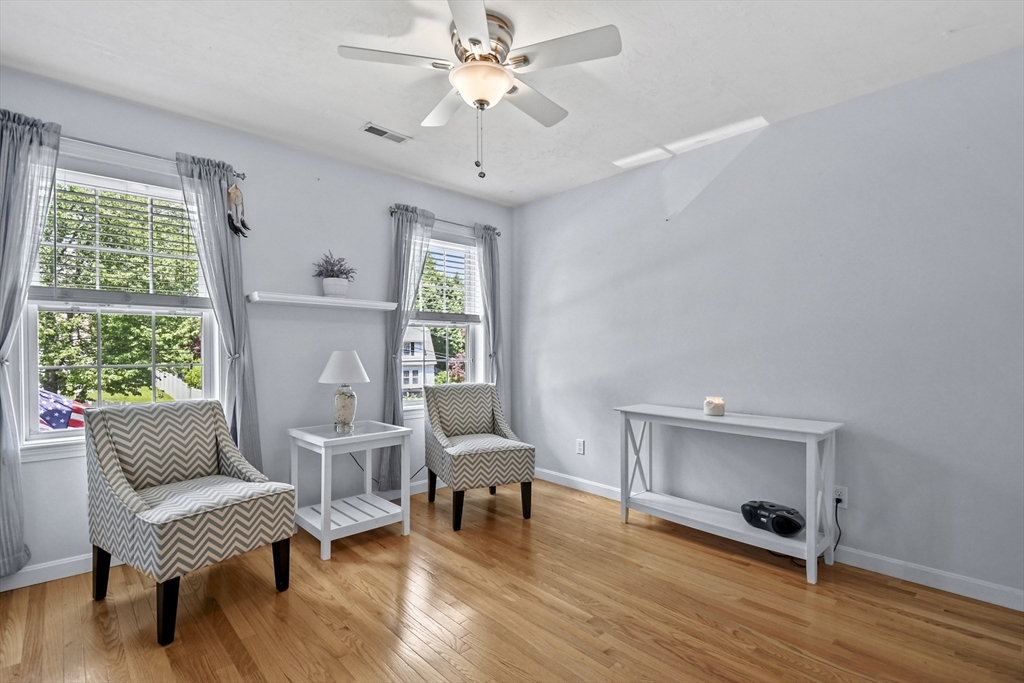 7 St Marks Road Worcester, MA 01606 - Photo 15 of 36 a living room with furniture and a window