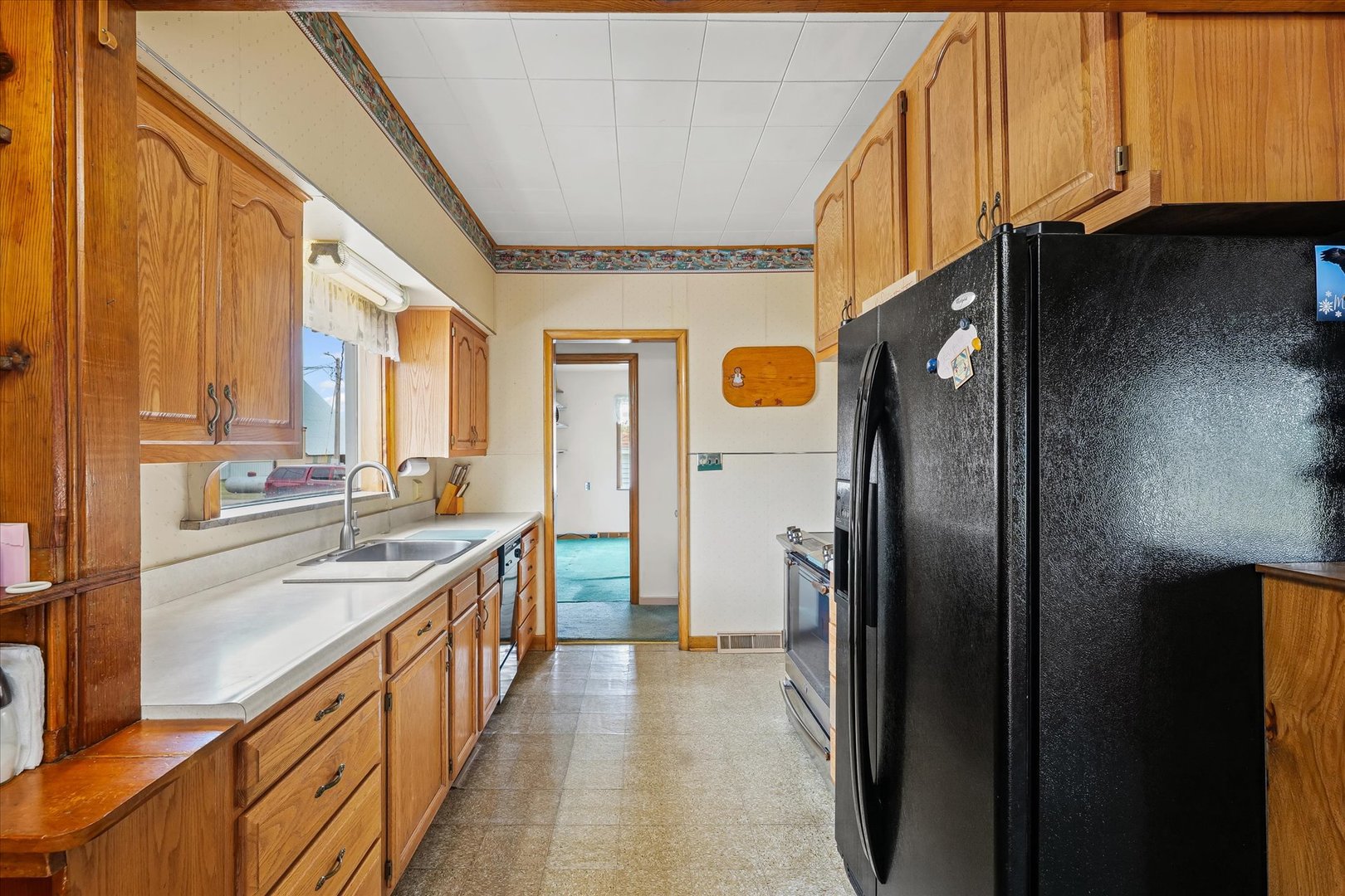 6292 North 100 East Road Allerton, IL 61810 - Photo 15 of 61 a kitchen with stainless steel appliances granite countertop a refrigerator and a stove
