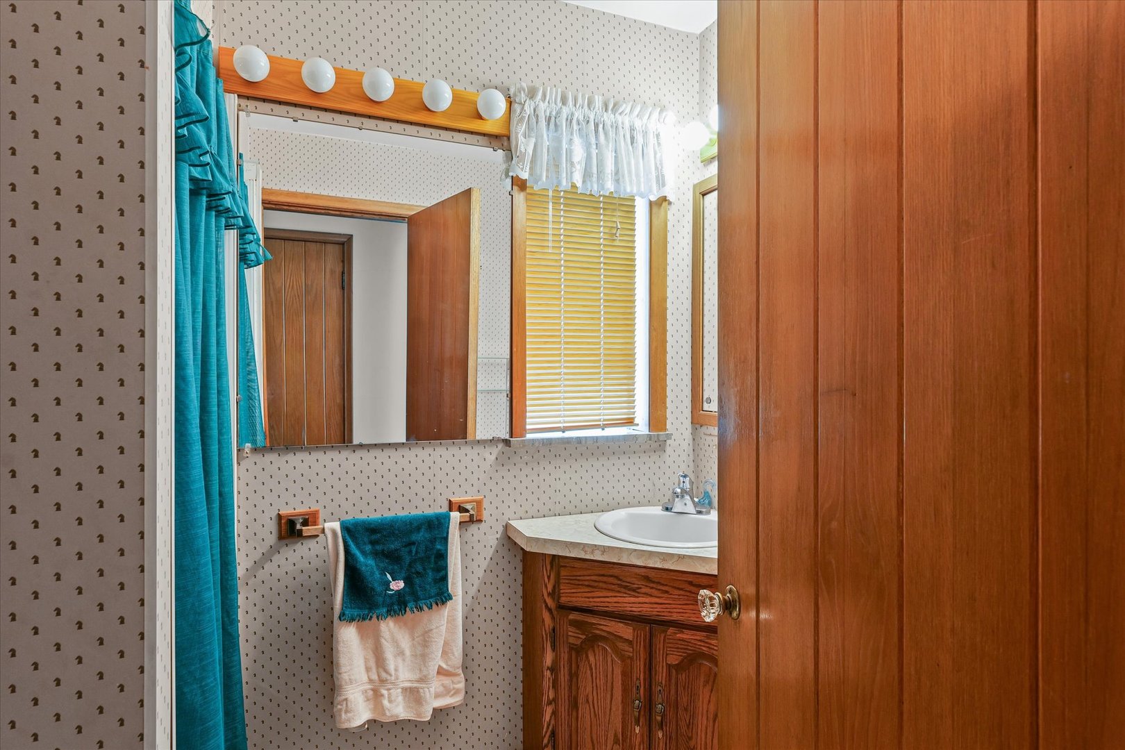 6292 North 100 East Road Allerton, IL 61810 - Photo 26 of 61 a bathroom with a sink and a mirror