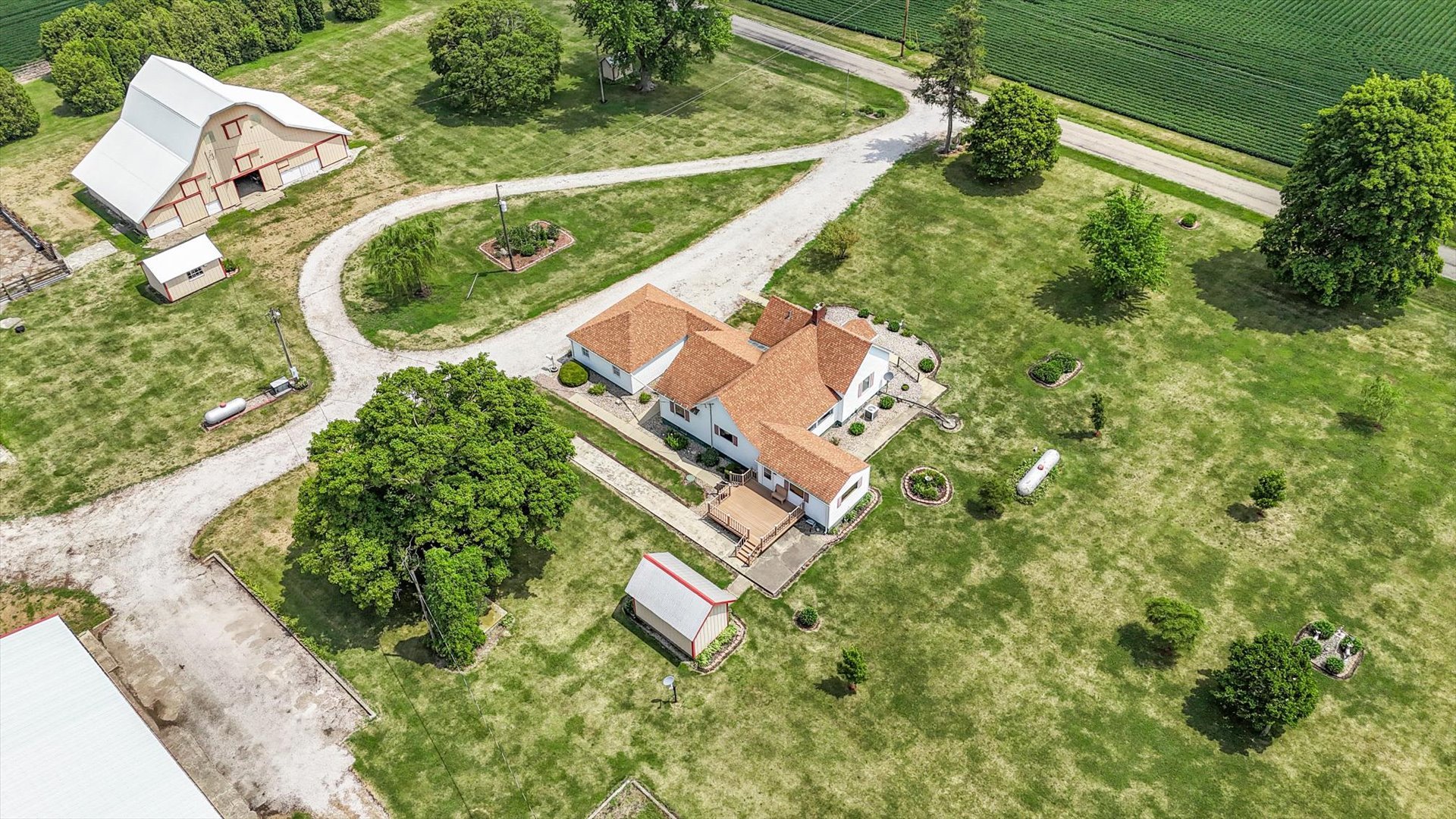 6292 North 100 East Road Allerton, IL 61810 - Photo 34 of 61 an aerial view of a house with a garden and swimming pool