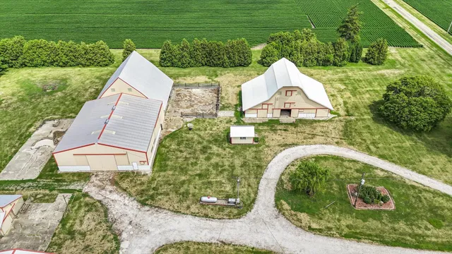 a view of a backyard with potted plants