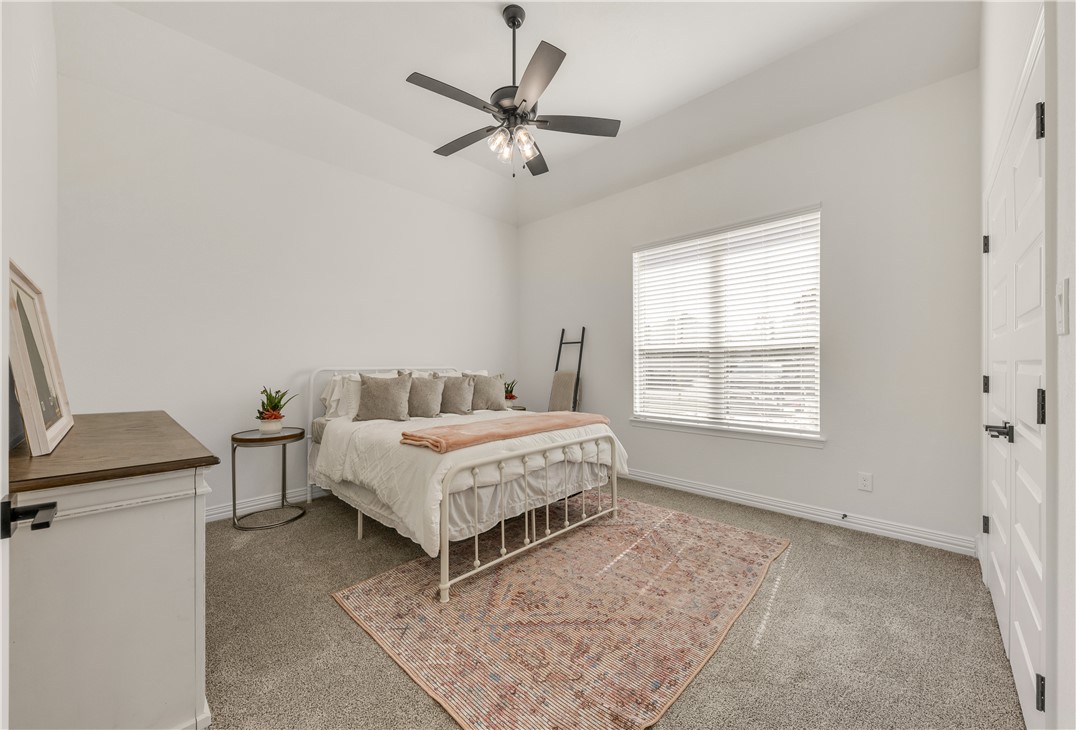 1624 Bennett Street Bryan, TX 77802 - Photo 10 of 22 a spacious bedroom with a bed and window