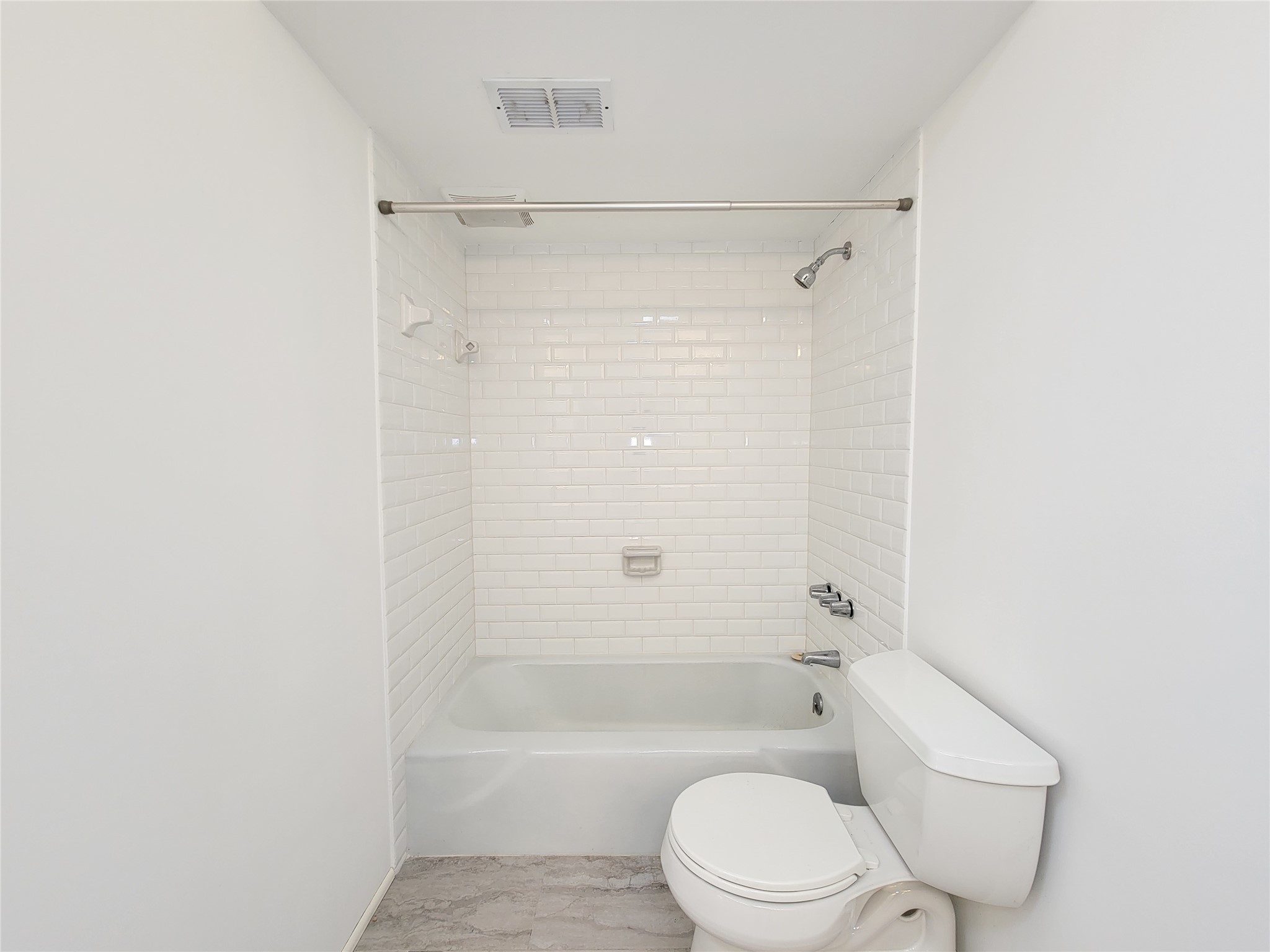 2243 West Alabama Street, Unit B Houston, TX 77098 - Photo 26 of 44 a bathroom with a toilet and shower