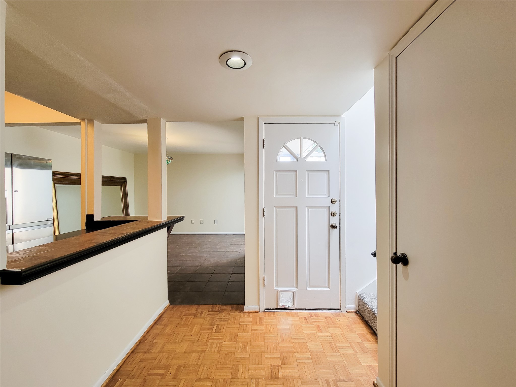 2243 West Alabama Street, Unit B Houston, TX 77098 - Photo 4 of 44 a view of a hallway with wooden floor and staircase