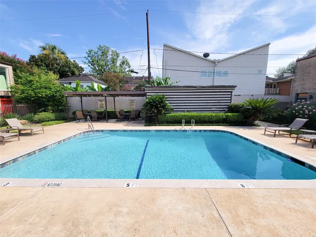 a view of a house with a garage and a garage