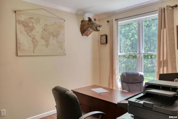 a very nice looking dining room with a table and chairs
