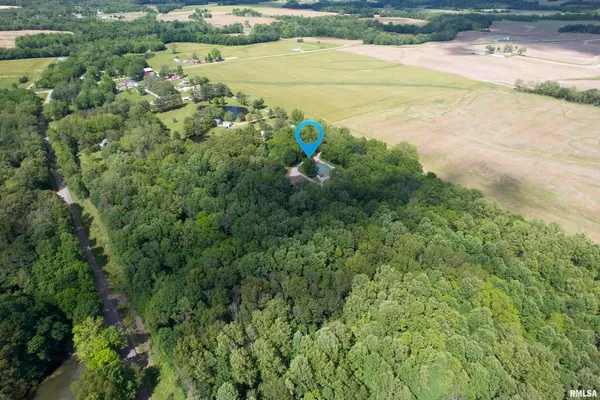 a balcony with table and chairs