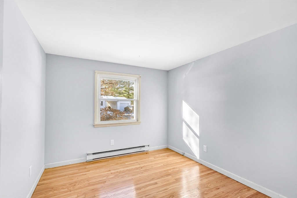 232 Spikenard Circle Springfield, MA 01129 - Photo 11 of 42 an empty room with windows