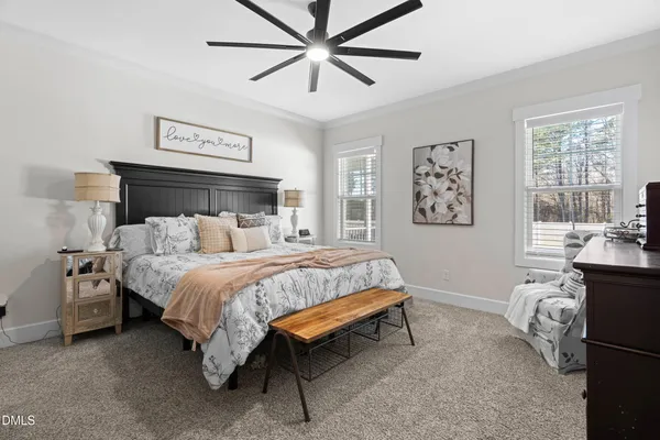 a bathroom with a granite countertop sink a mirror and shower