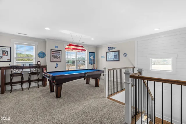 a bathroom with a sink double vanity and a mirror