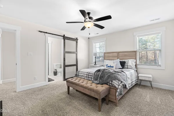 a bedroom with bed and a bed