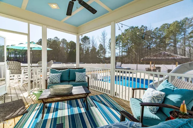 a view of an outdoor space with furniture