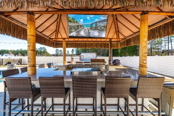 a view of a swimming pool with a patio