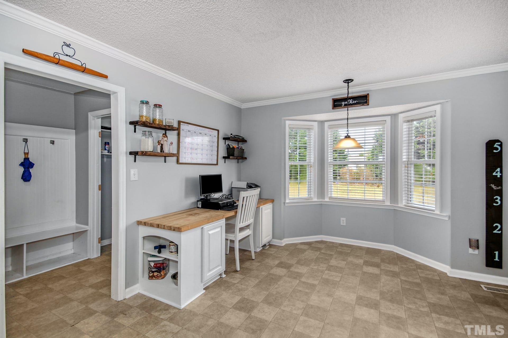 1013 Holland Ridge Drive Raleigh, NC 27603 - Photo 11 of 29 a view of kitchen and windows