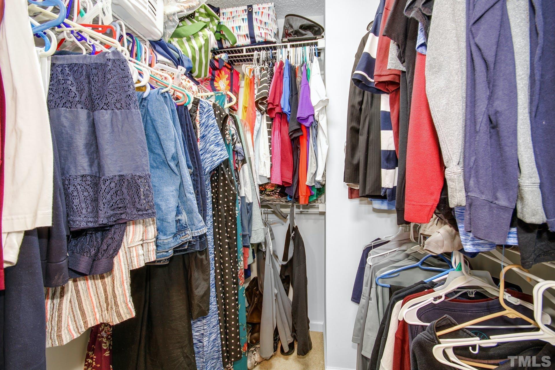 1013 Holland Ridge Drive Raleigh, NC 27603 - Photo 18 of 29 a view of walk in closet with clothes