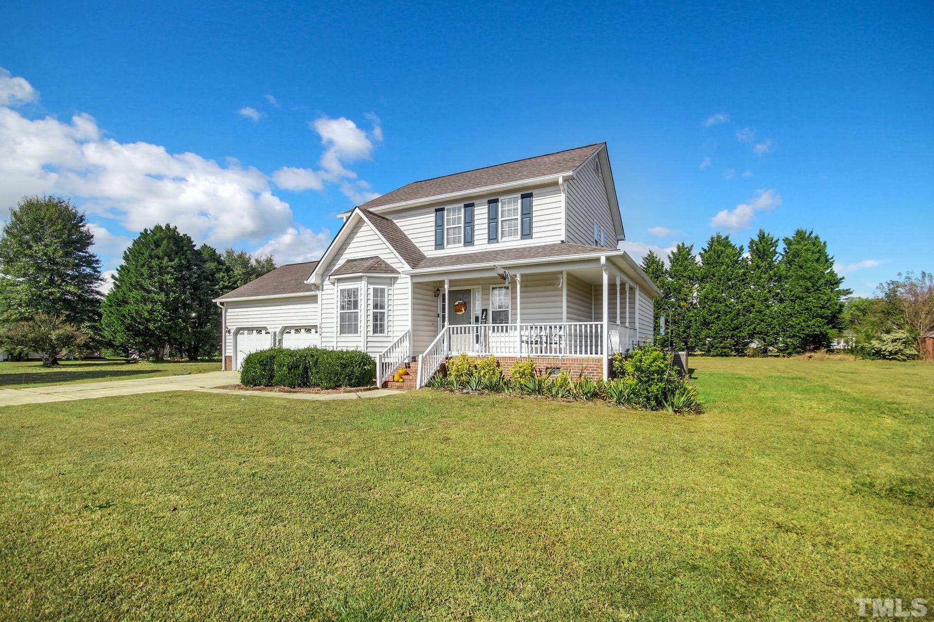 1013 Holland Ridge Drive Raleigh, NC 27603 - Photo 28 of 29 a view of a house with a big yard