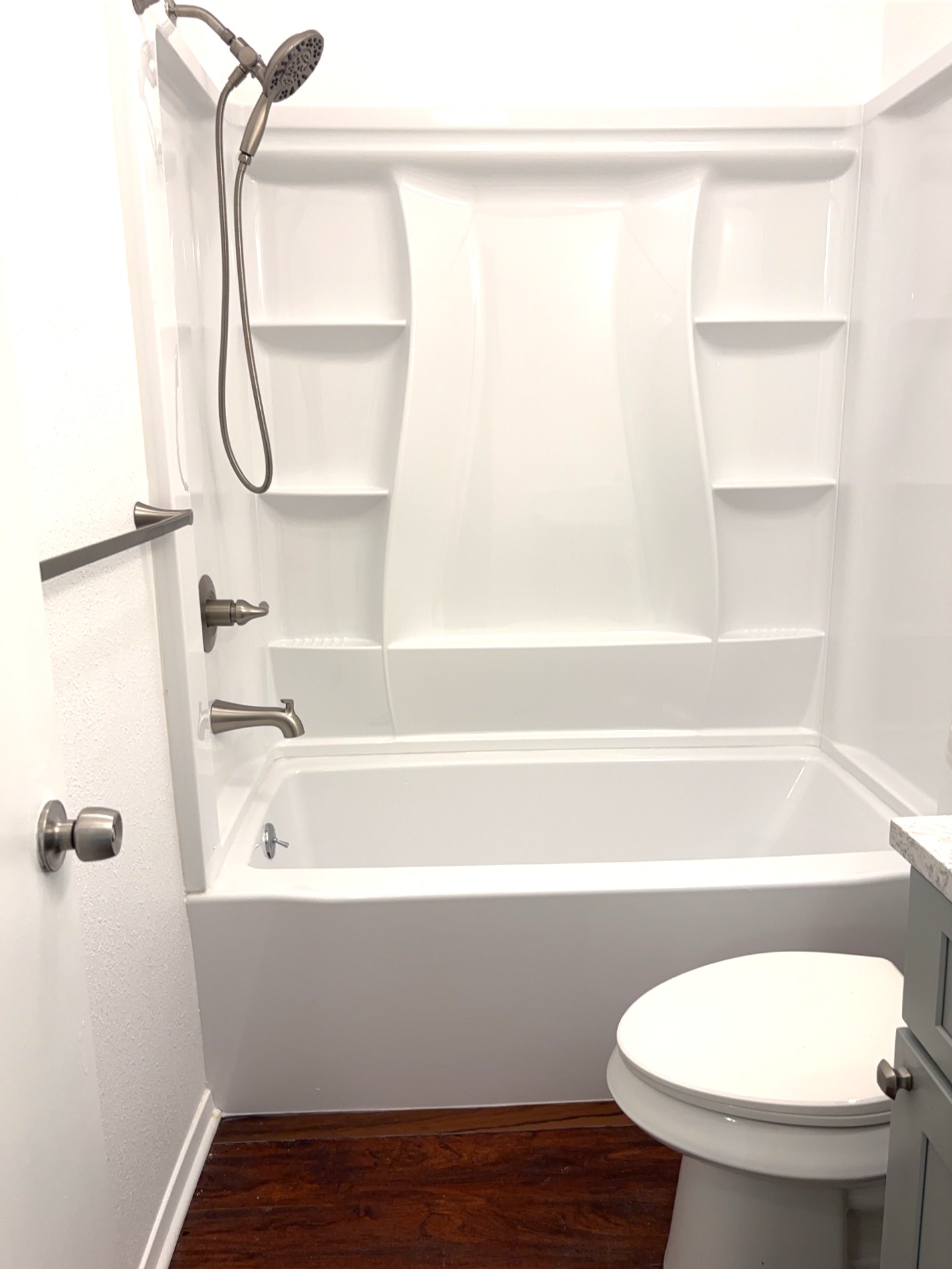 16005 Stoneham Circle Pflugerville, TX 78660 - Photo 15 of 18 Bathroom with wood finished floors, shower / bath combination, and vanity