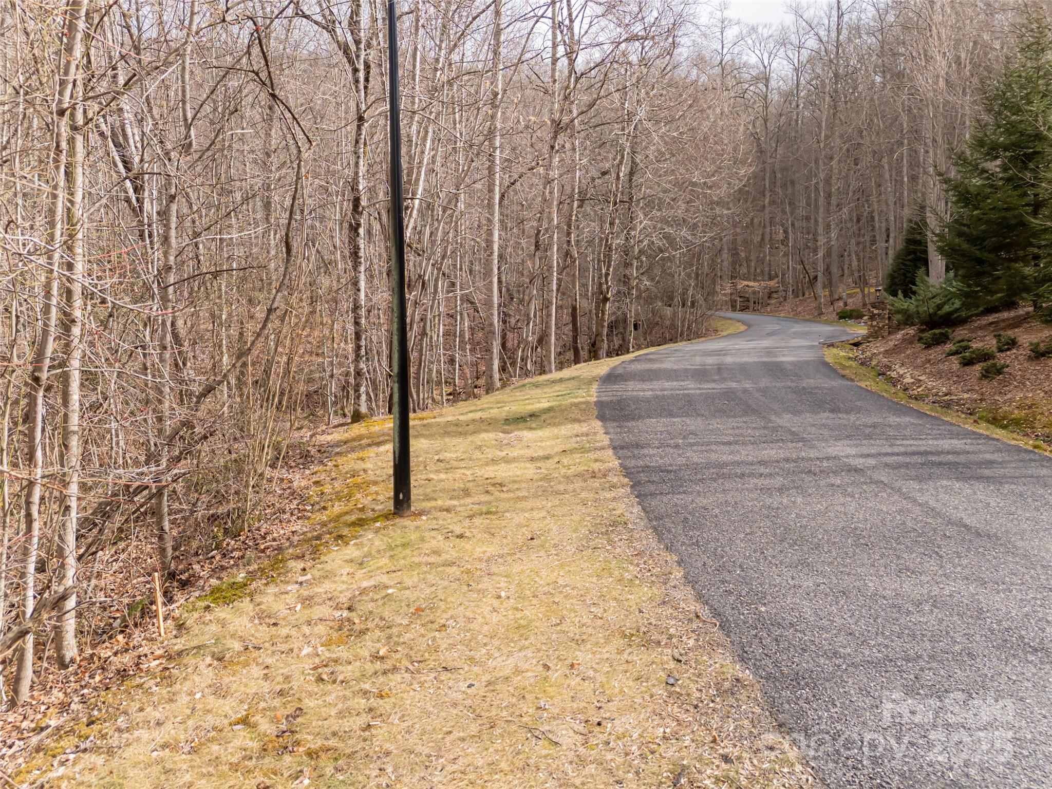 522-528 Blue Mist Way Arden, NC 28704 - Photo 19 of 36 a view of a pathway with a yard