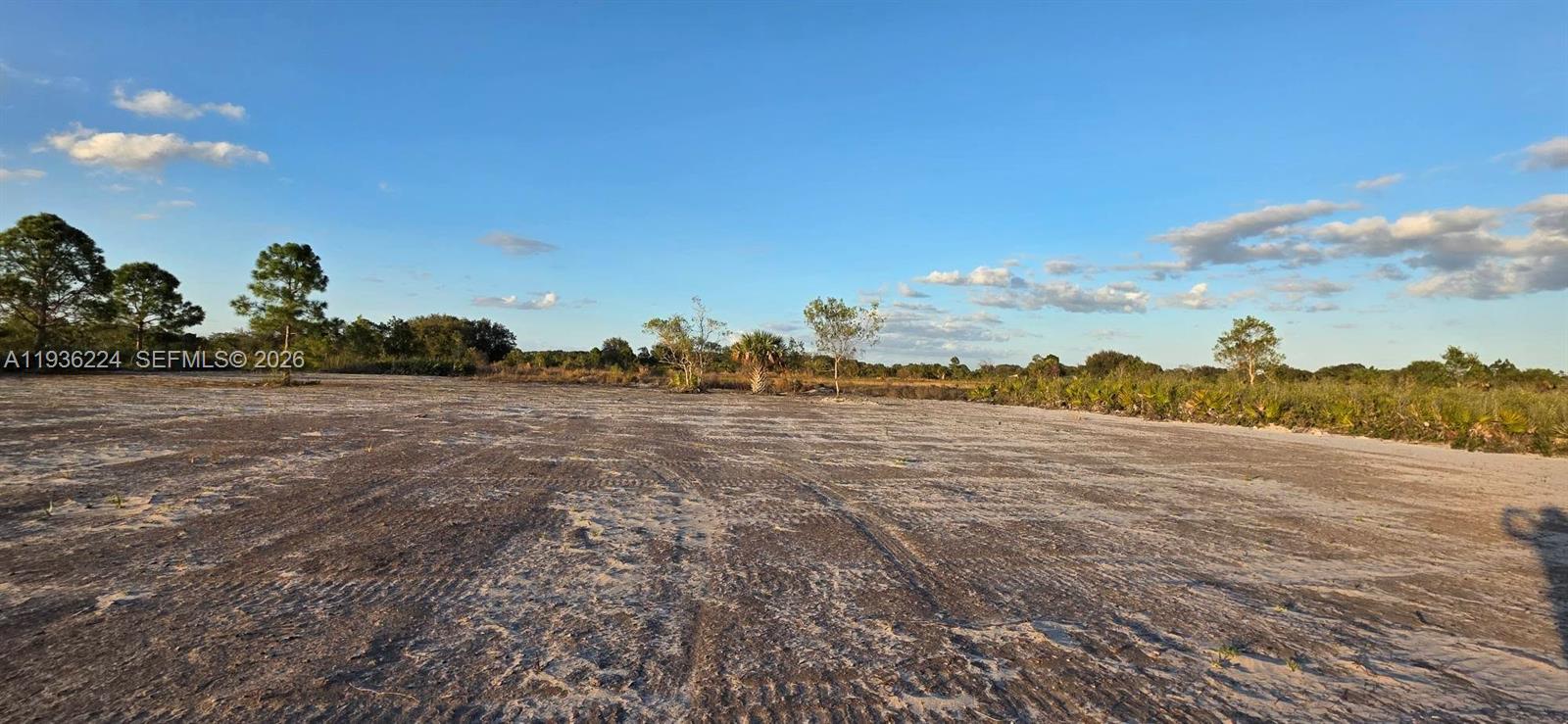 17385 Northwest 314th Street Okeechobee, FL 34972 - Photo 14 of 17 a view of a town with an ocean