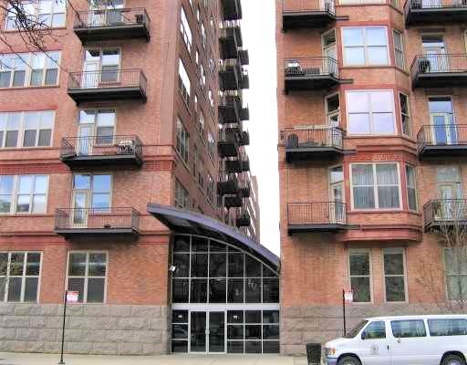 500 South Clinton Street, Unit 611 Chicago, IL 60607 - Photo 1 of 19 a view of a building with a lot of windows