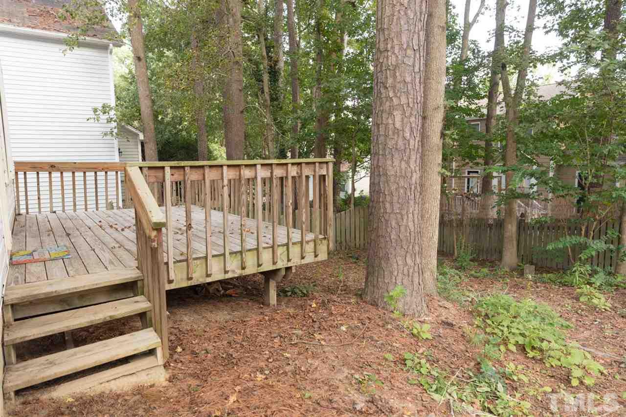 4713 Tolley Court Raleigh, NC 27616 - Photo 25 of 28 a view of backyard with green space