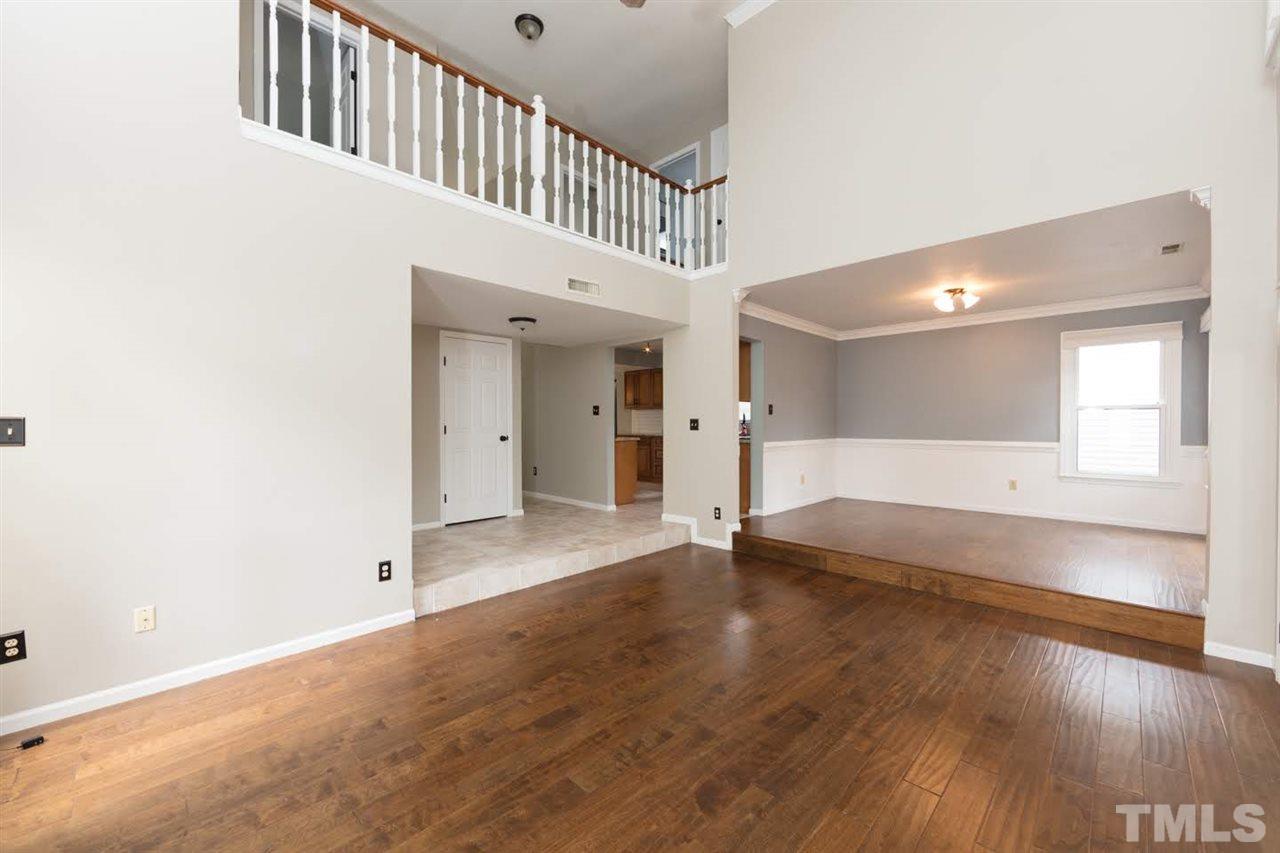 4713 Tolley Court Raleigh, NC 27616 - Photo 6 of 28 a view of an entryway with wooden floor
