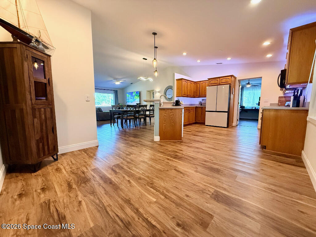 9010 Central Avenue Sebastian, FL 32976 - Photo 11 of 18 a view of dining room with furniture and wooden floor