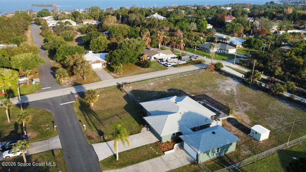 9010 Central Avenue Sebastian, FL 32976 - Photo 2 of 18 an aerial view of a house with a yard