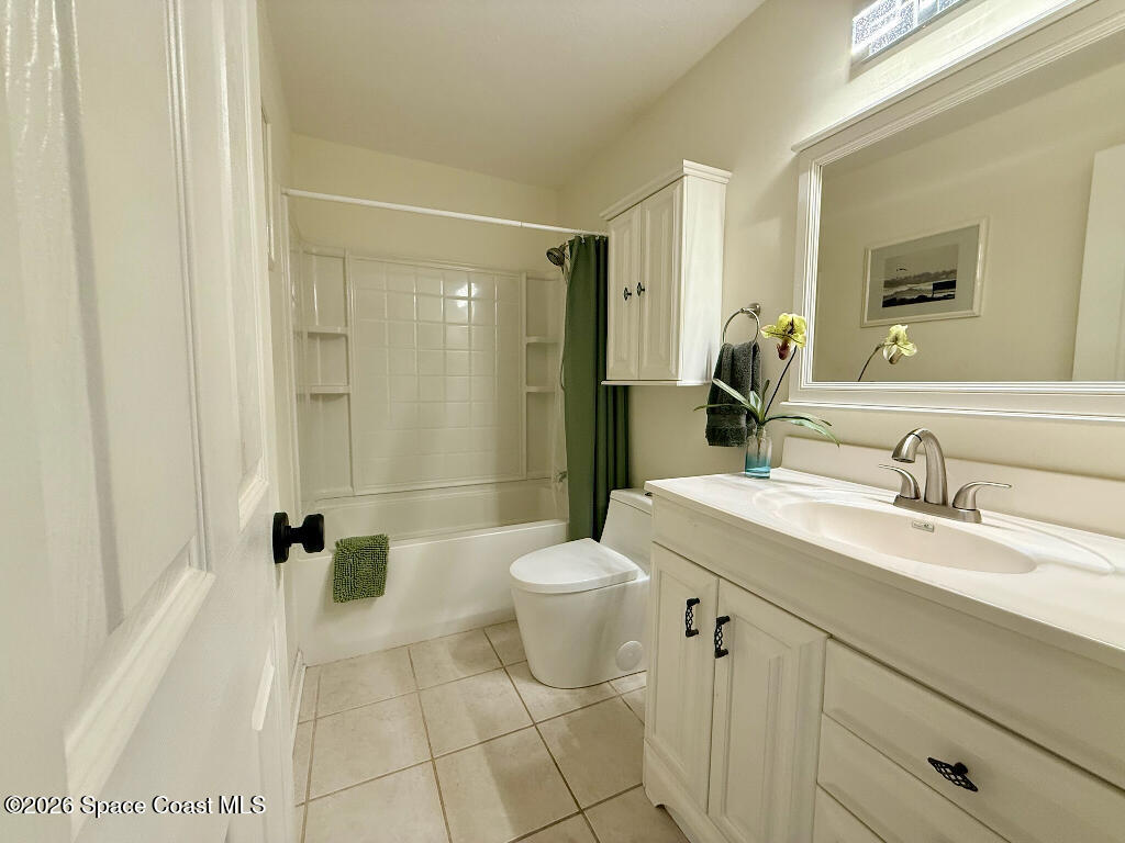 9010 Central Avenue Sebastian, FL 32976 - Photo 7 of 18 a bathroom with a sink a toilet and shower