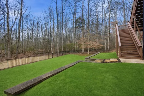 a view of a backyard with a garden