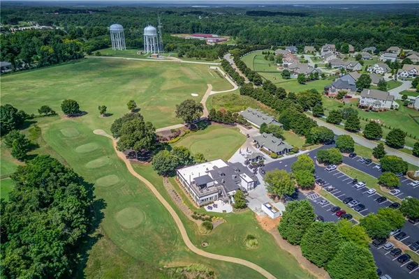 a group of people sitting in front of a building