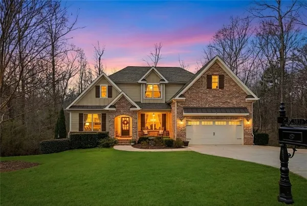 a view of a yard with chairs