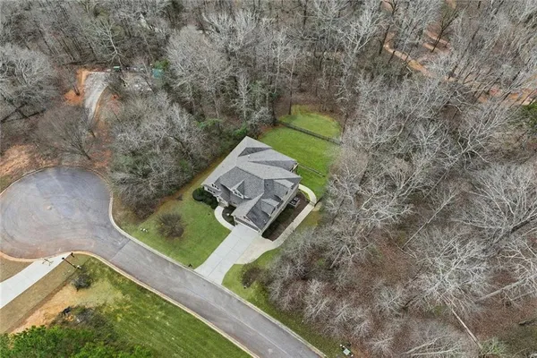 a view of a room with wooden ceiling