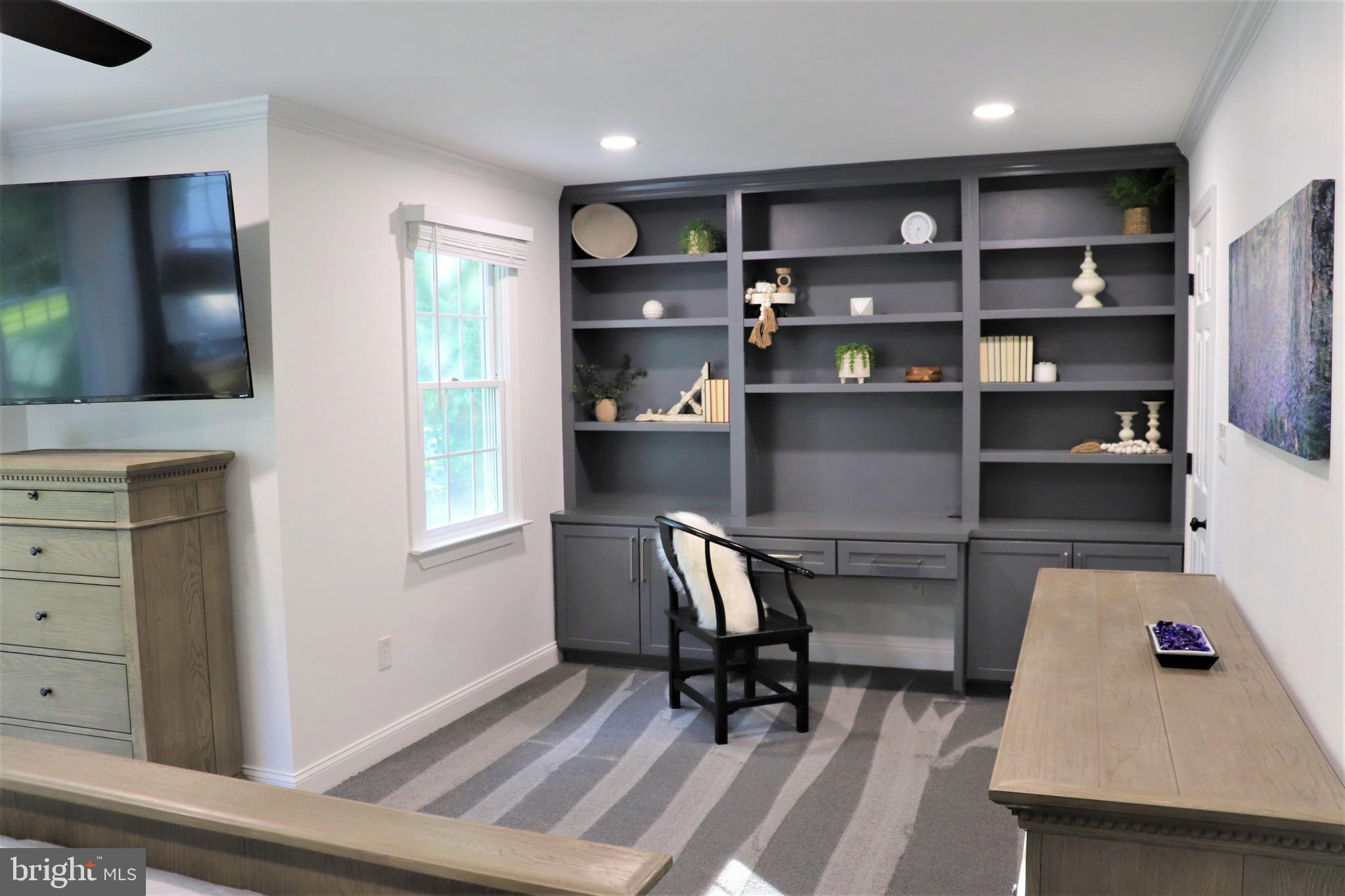 8205 Dry Ridge Road Montgomery Village, MD 20886 - Photo 18 of 44 Master Bedroom w/ Built-in Bookshelves/office