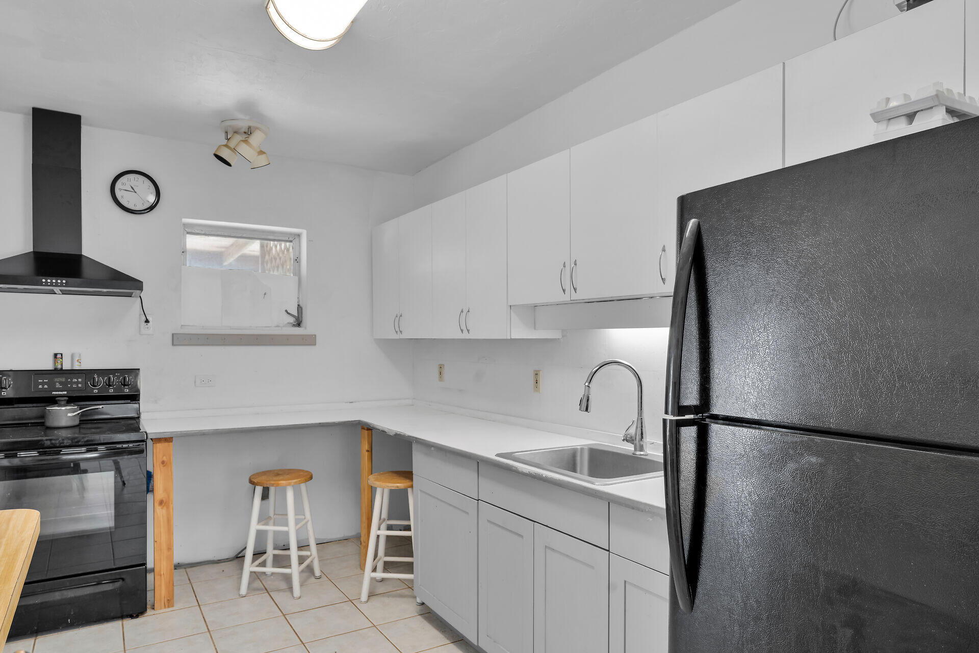 798 96th Street Marathon, FL 33050 - Photo 13 of 28 a kitchen with a sink appliances and cabinets