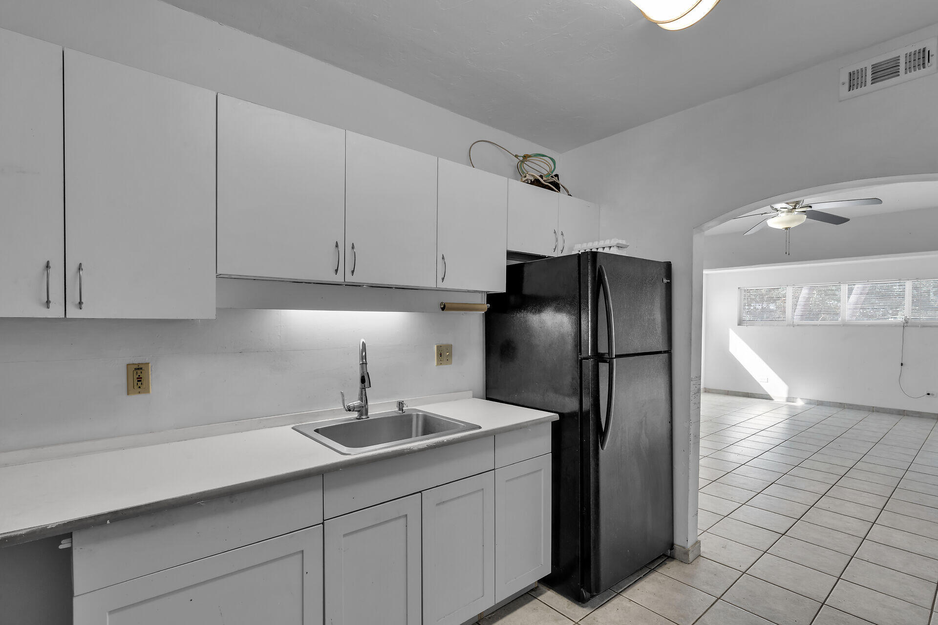 798 96th Street Marathon, FL 33050 - Photo 15 of 28 a kitchen with stainless steel appliances a refrigerator and a sink
