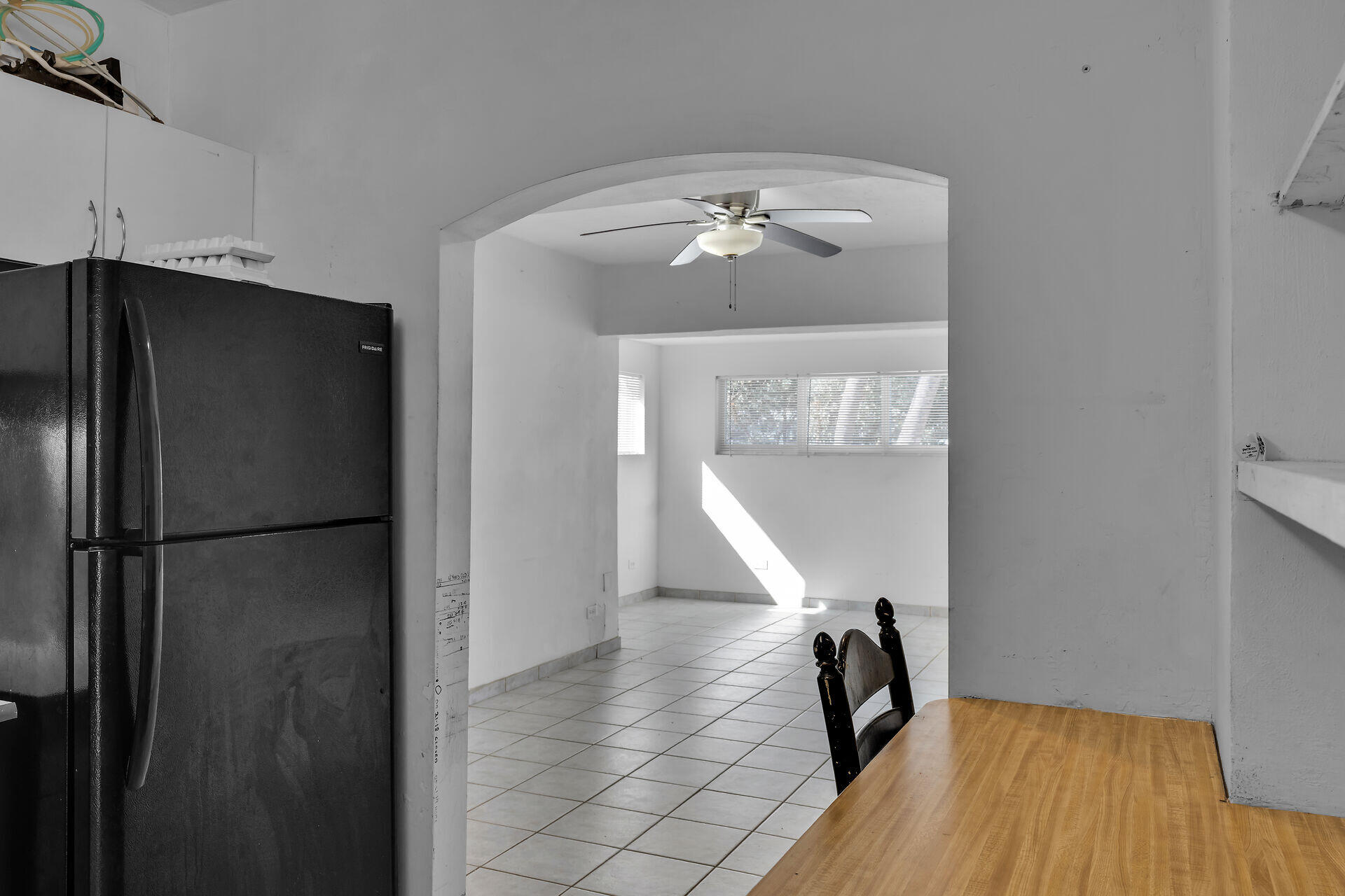798 96th Street Marathon, FL 33050 - Photo 16 of 28 a view of a kitchen with a refrigerator and wooden floor
