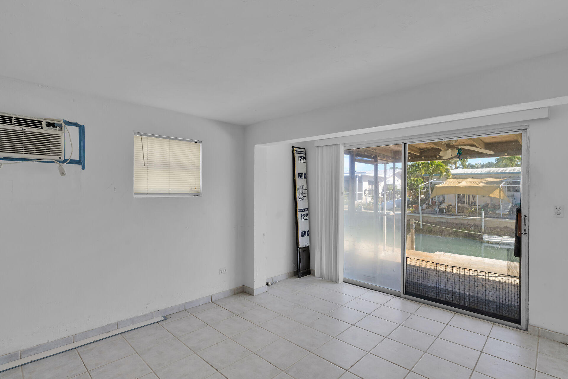 798 96th Street Marathon, FL 33050 - Photo 17 of 28 a view of empty room with floor to ceiling window