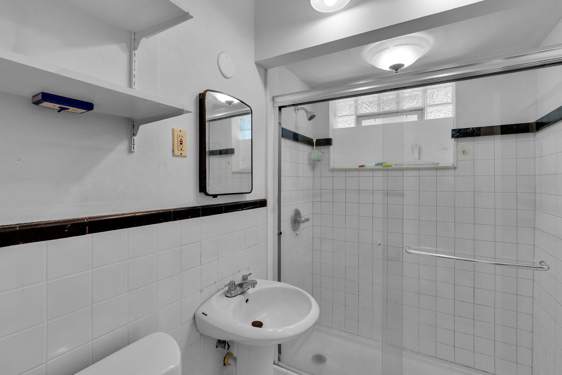 798 96th Street Marathon, FL 33050 - Photo 26 of 28 a bathroom with a sink toilet and shower