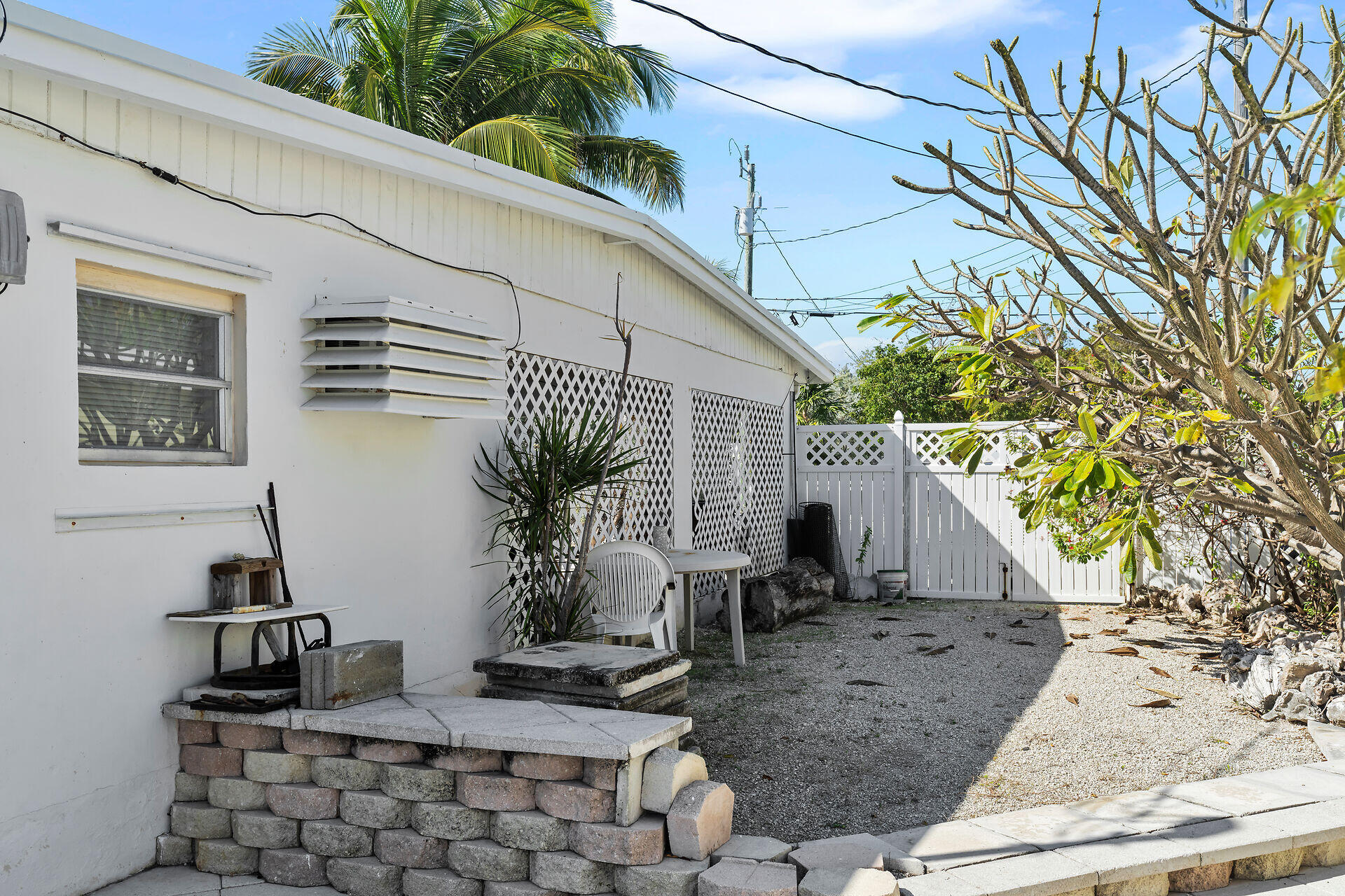 798 96th Street Marathon, FL 33050 - Photo 27 of 28 a view of house with patio outdoor seating