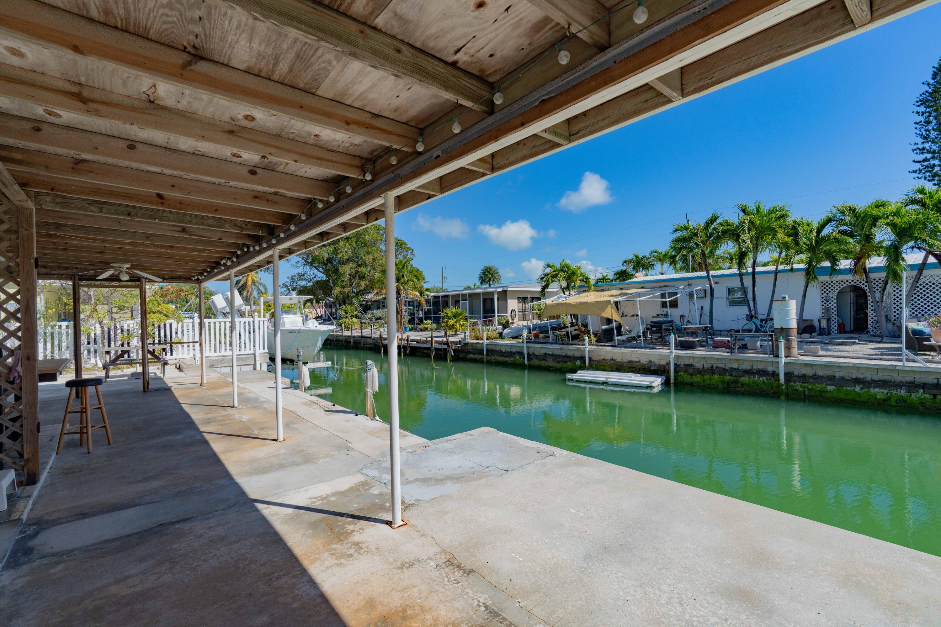798 96th Street Marathon, FL 33050 - Photo 5 of 28 a view of a swimming pool with a patio