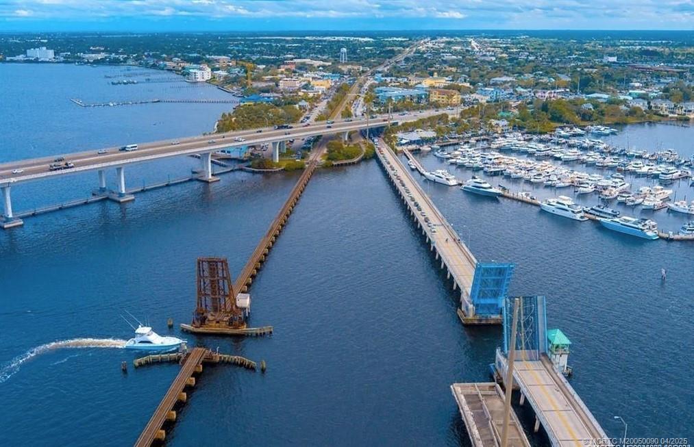 2950 Southeast Ocean Boulevard, Unit 66 Stuart, FL 34996 - Photo 17 of 18 an aerial view of residential houses with outdoor space