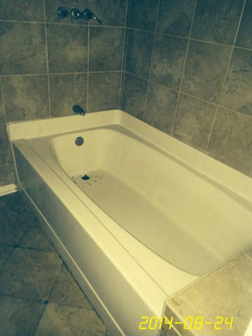 4233 Bob Sikes Road DeFuniak Springs, FL 32435 - Photo 4 of 5 a bathroom with a bathtub